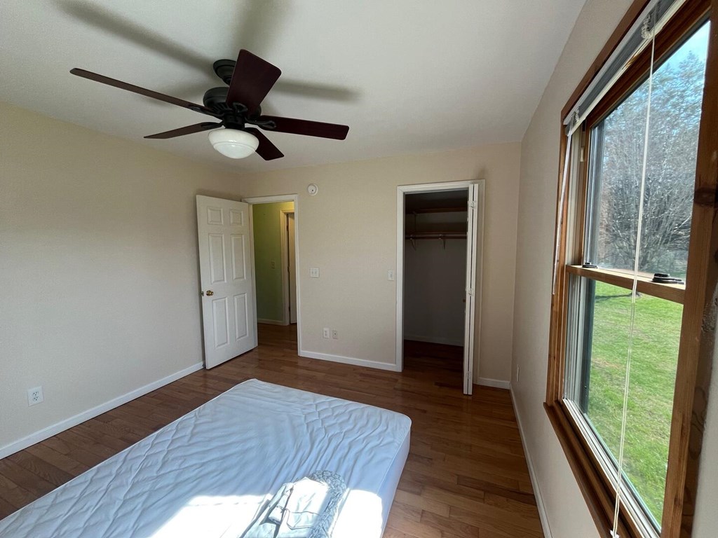 142 Arrowhead Trail Hayesville, NC 28904 - Photo 23 of 41 a view of empty room with wooden floor and fan