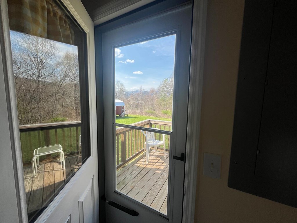 142 Arrowhead Trail Hayesville, NC 28904 - Photo 25 of 41 a view of a glass door with a balcony from a room