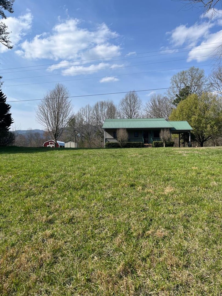 142 Arrowhead Trail Hayesville, NC 28904 - Photo 37 of 41 a view of a big yard with large trees