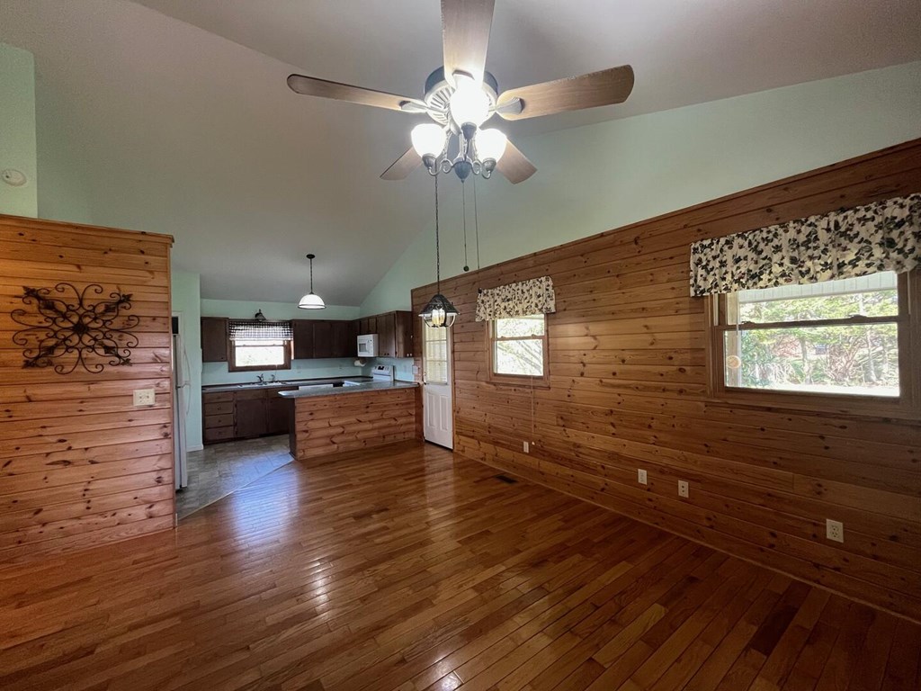 142 Arrowhead Trail Hayesville, NC 28904 - Photo 4 of 41 a view of a livingroom with furniture and a ceiling fan