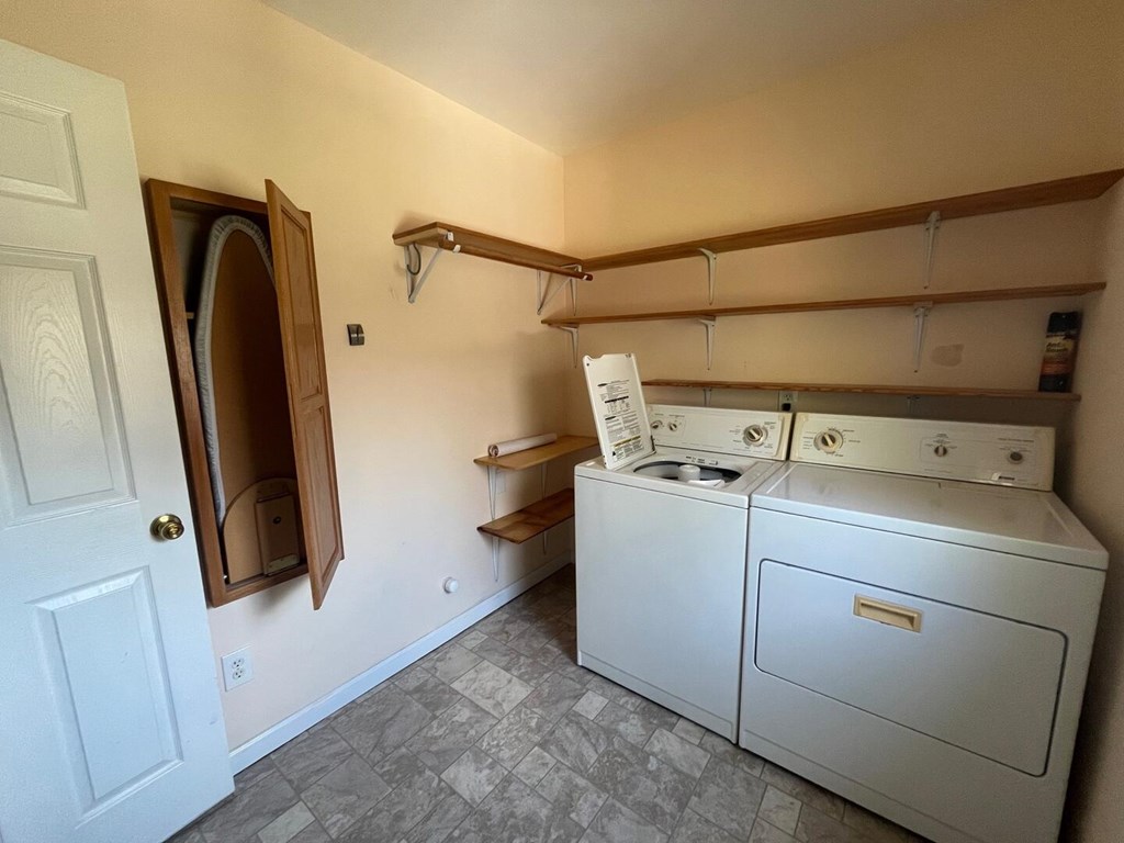 142 Arrowhead Trail Hayesville, NC 28904 - Photo 9 of 41 a utility room with dryer and washer