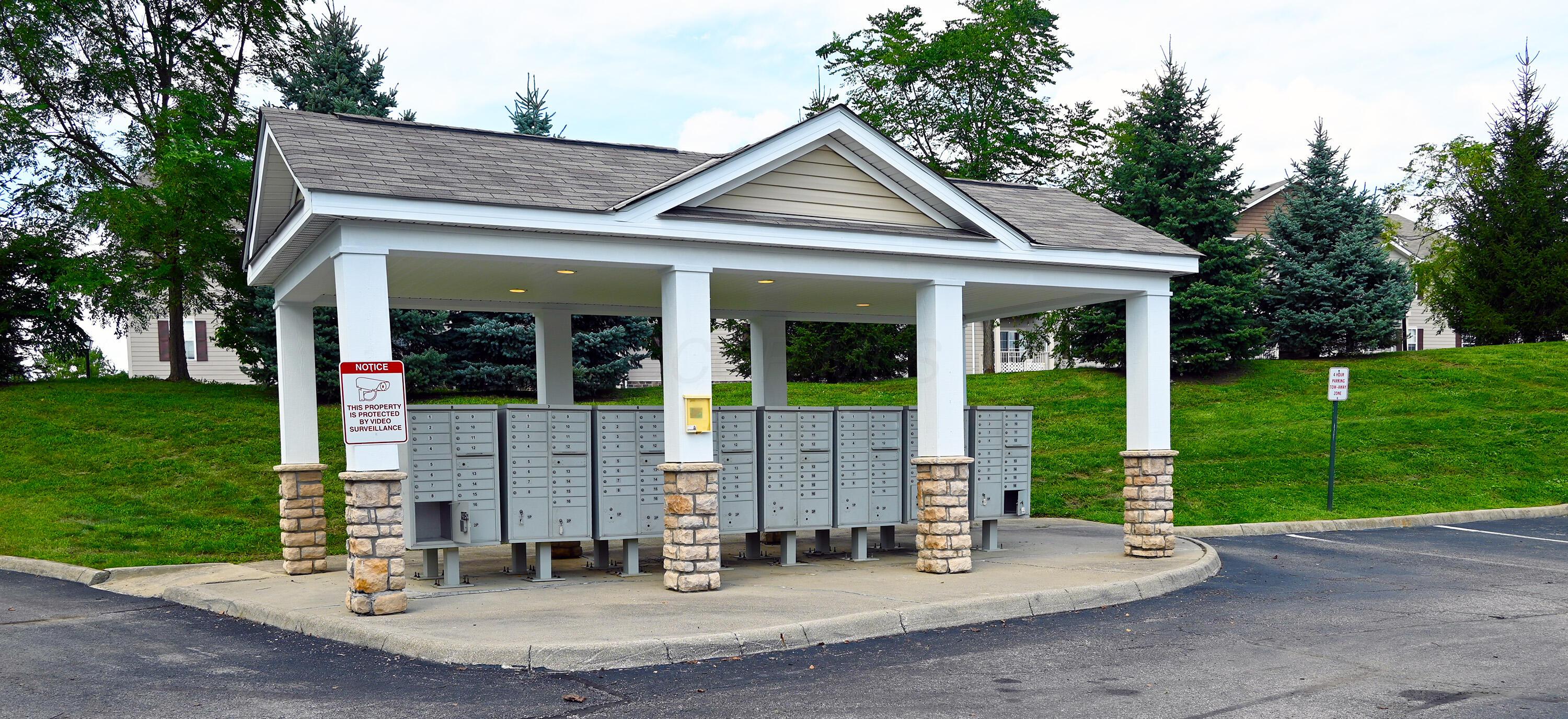 8289 Bruntsfield Road Columbus, OH 43235 - Photo 28 of 36 Resident mailbox pavilion offering convenient, centralized mail service with covered access and attractive architectural design that complements the Traditions at Highbluffs community.