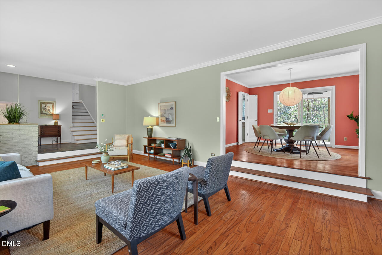 2734 Spencer Street Durham, NC 27705 - Photo 15 of 61 a dining room with furniture and wooden floor