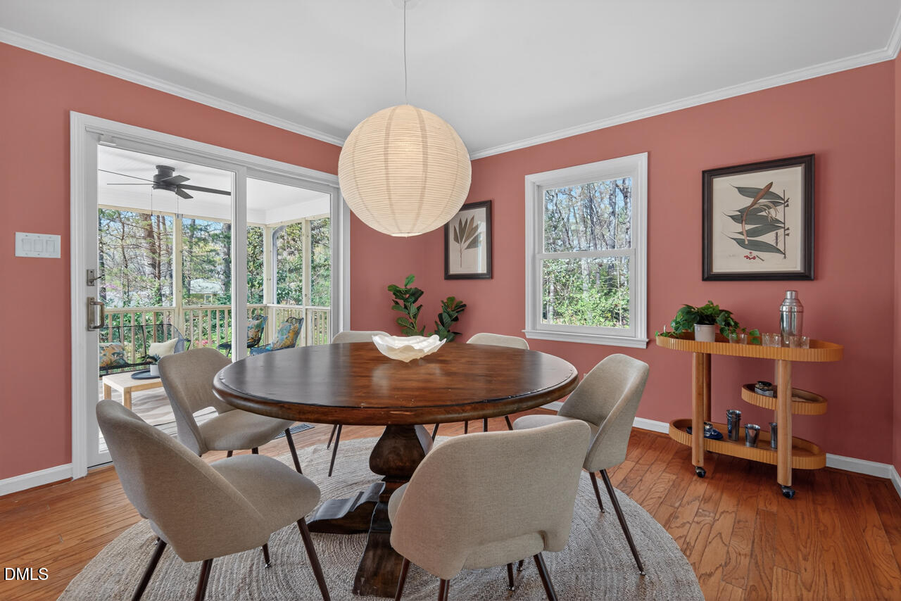 2734 Spencer Street Durham, NC 27705 - Photo 18 of 61 a view of a dining room with furniture window and wooden floor