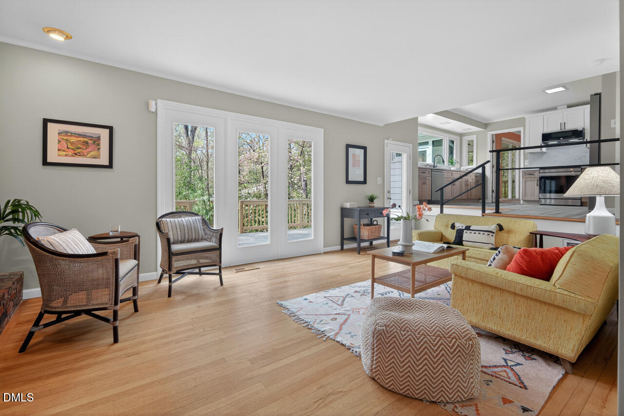 2734 Spencer Street Durham, NC 27705 - Photo 31 of 61 a living room with furniture and a large window