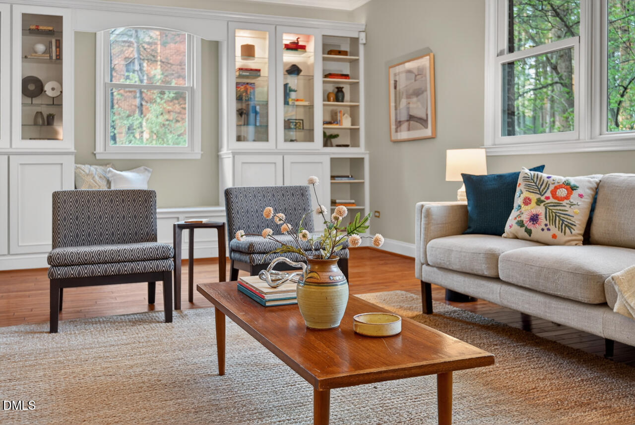 2734 Spencer Street Durham, NC 27705 - Photo 10 of 61 a living room with furniture a table and a potted plant