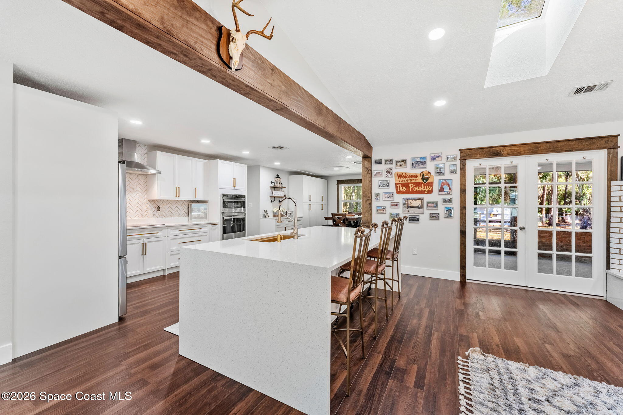 3975 Corey Road Malabar, FL 32950 - Photo 17 of 53 a view of a kitchen and dining room
