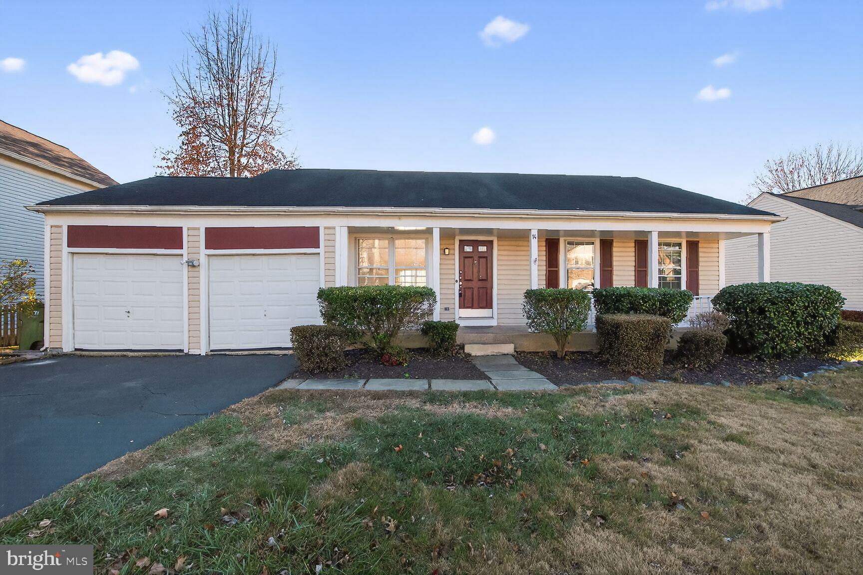 14 Braxton Drive Sterling, VA 20165 - Photo 1 of 28 a house view with a garden space