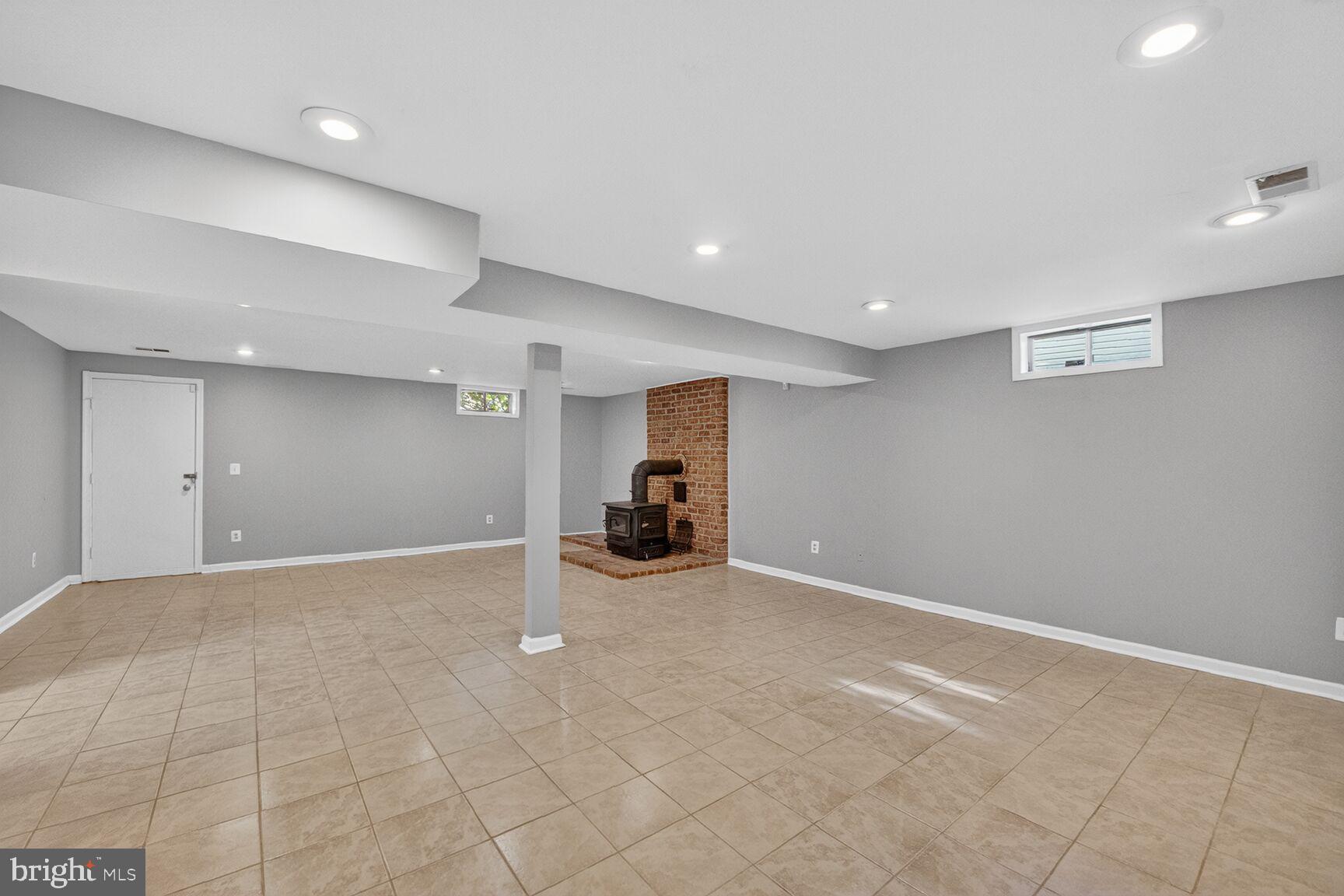 14 Braxton Drive Sterling, VA 20165 - Photo 20 of 28 a view of a livingroom with a fireplace and window