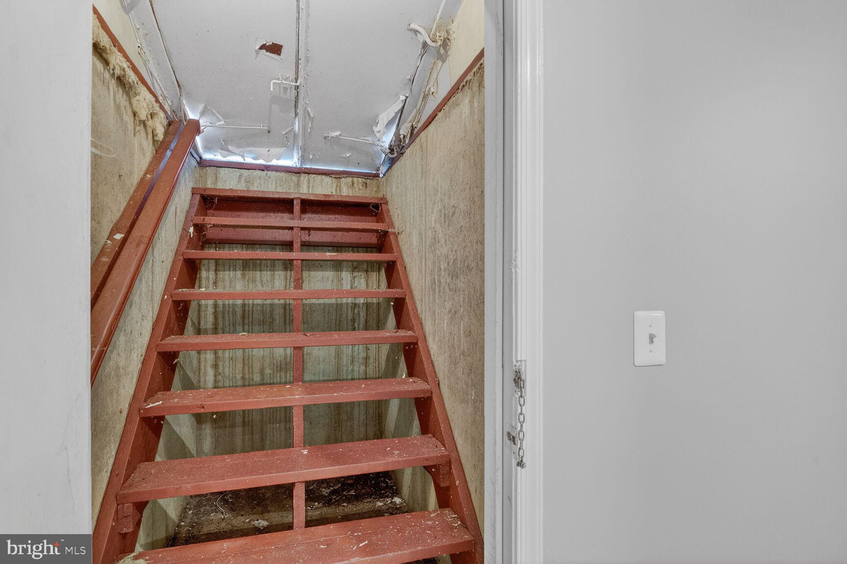 14 Braxton Drive Sterling, VA 20165 - Photo 23 of 28 a view of staircase with wooden floor and white walls