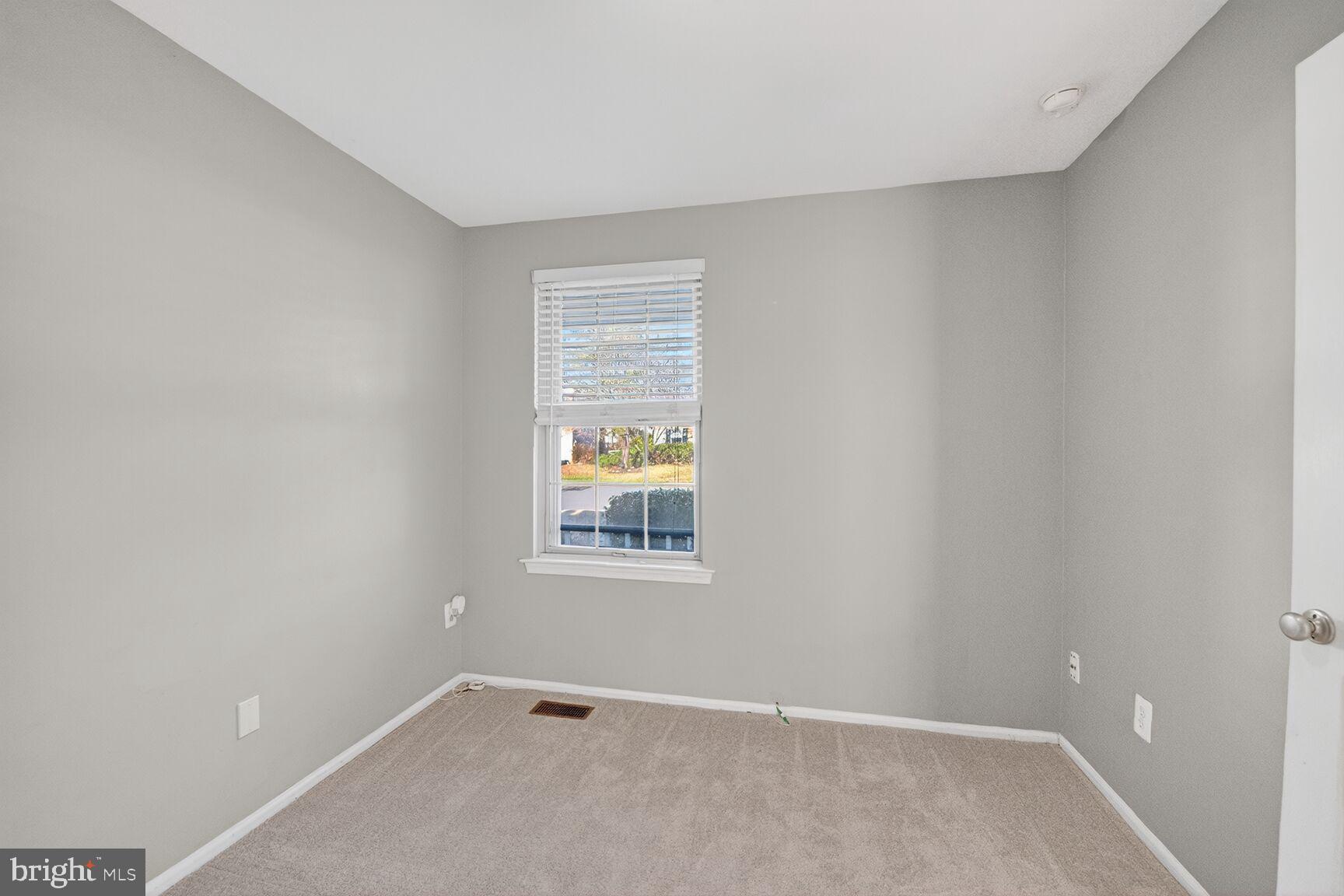 14 Braxton Drive Sterling, VA 20165 - Photo 10 of 28 an empty room with a window