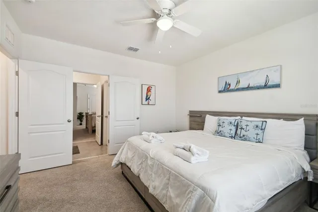a bathroom with a sink double vanity and a mirror