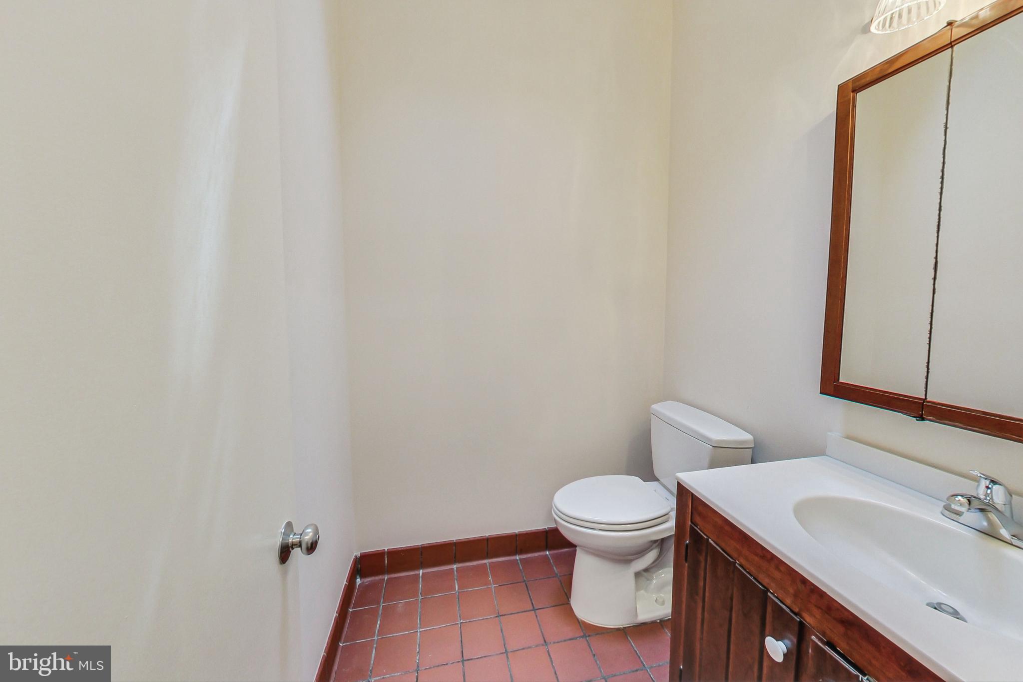 9206 Potomac Ridge Road Great Falls, VA 22066 - Photo 20 of 60 Half Bathroom