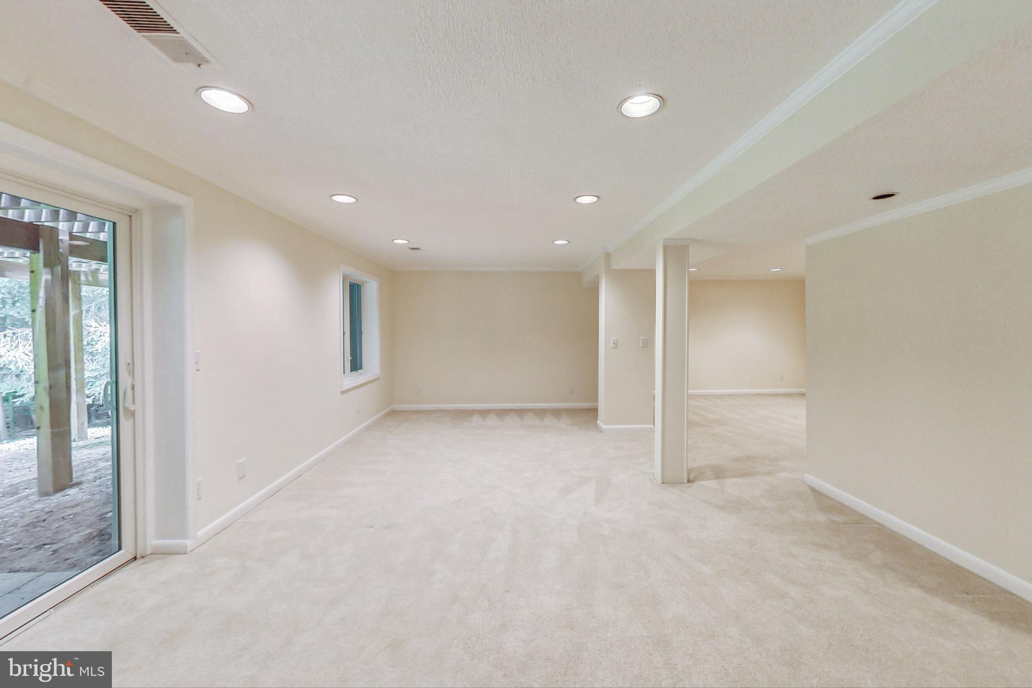 9206 Potomac Ridge Road Great Falls, VA 22066 - Photo 42 of 60 Basement Rec Room