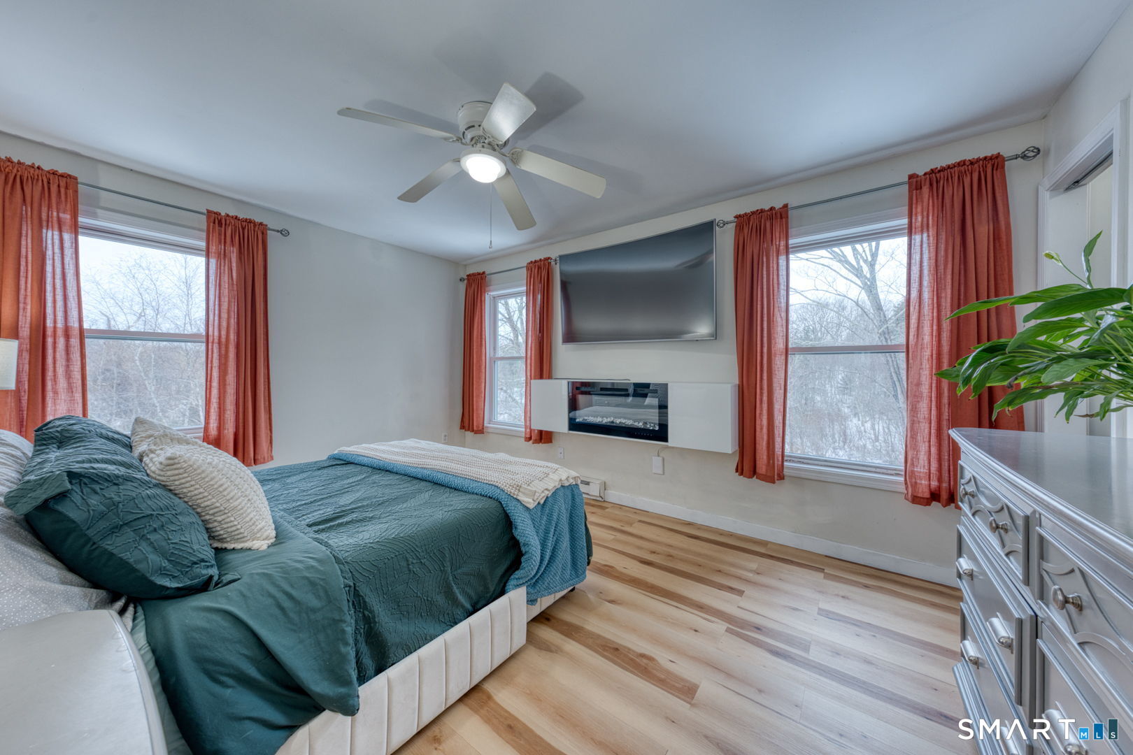 1-3 Young Street East Hampton, CT 06424 - Photo 17 of 36 a bedroom with a large bed and a window