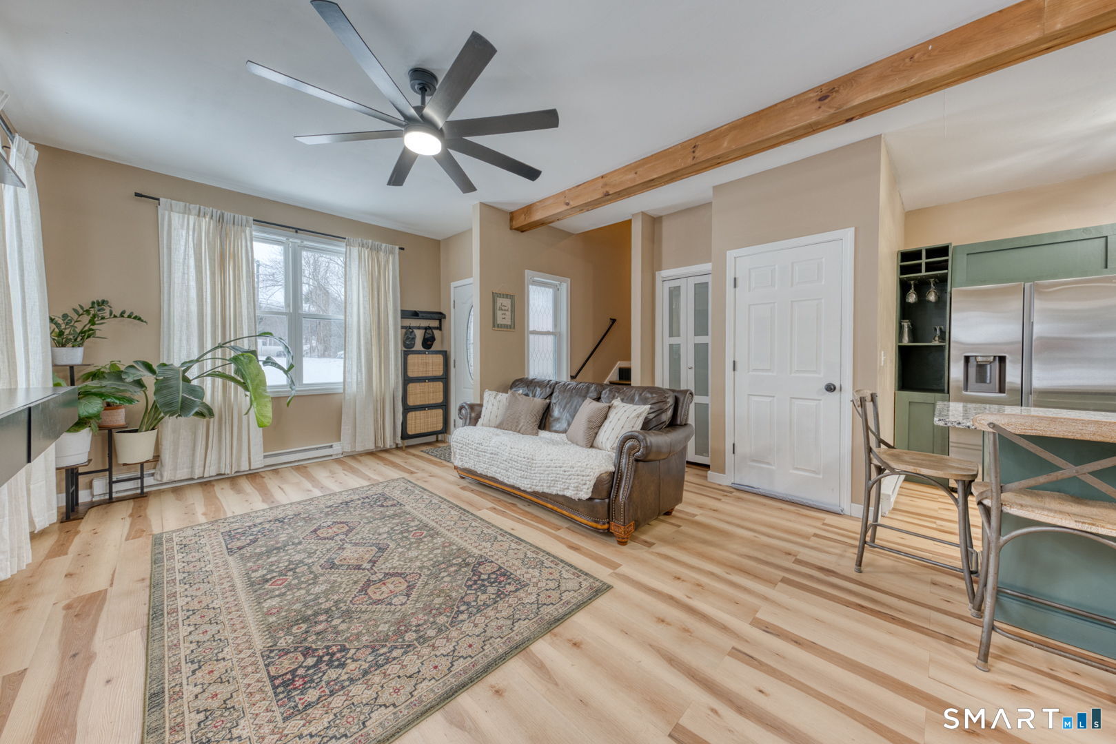 1-3 Young Street East Hampton, CT 06424 - Photo 8 of 36 a living room with furniture and a large window