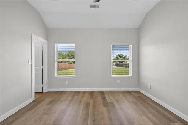 a view of a room with racks on the wall