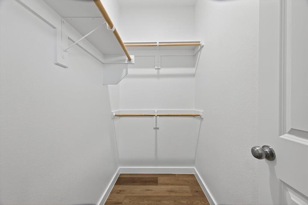 122 Wood Street, Unit A Princeton, TX 75407 - Photo 18 of 29 a view of a room with racks on the wall