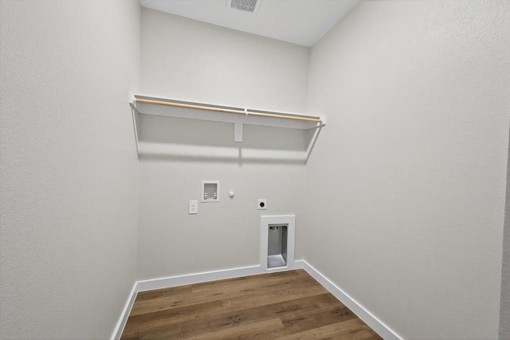 122 Wood Street, Unit A Princeton, TX 75407 - Photo 22 of 29 a view of small space with racks on the wall