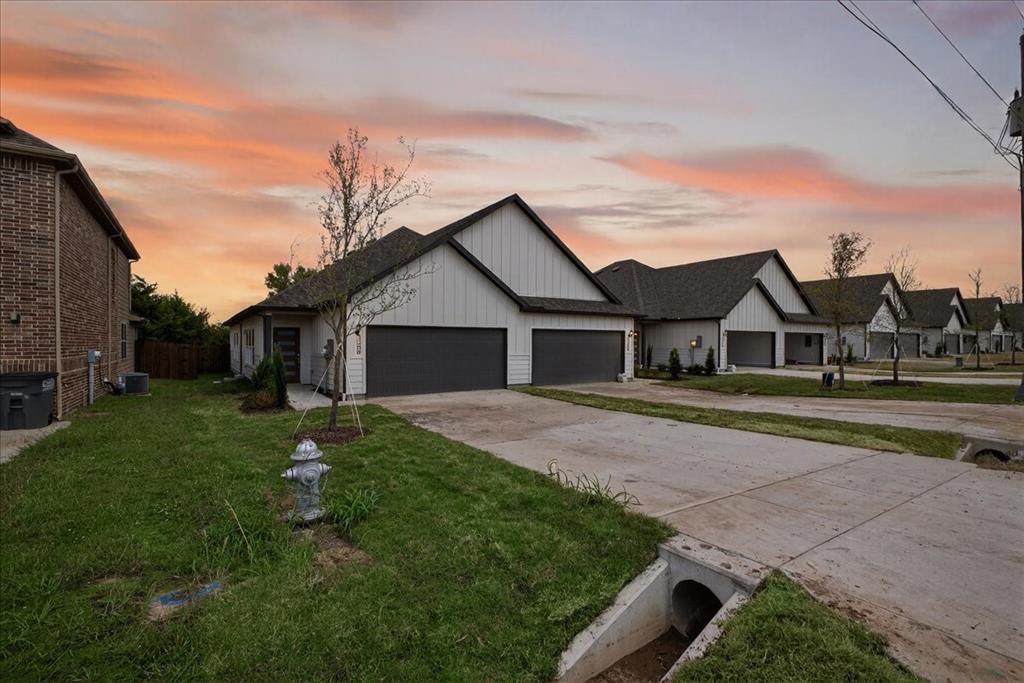 122 Wood Street, Unit A Princeton, TX 75407 - Photo 28 of 29 a front view of a house with a garden