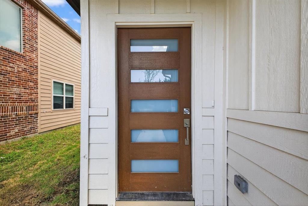 122 Wood Street, Unit A Princeton, TX 75407 - Photo 4 of 29 a view of front door of house