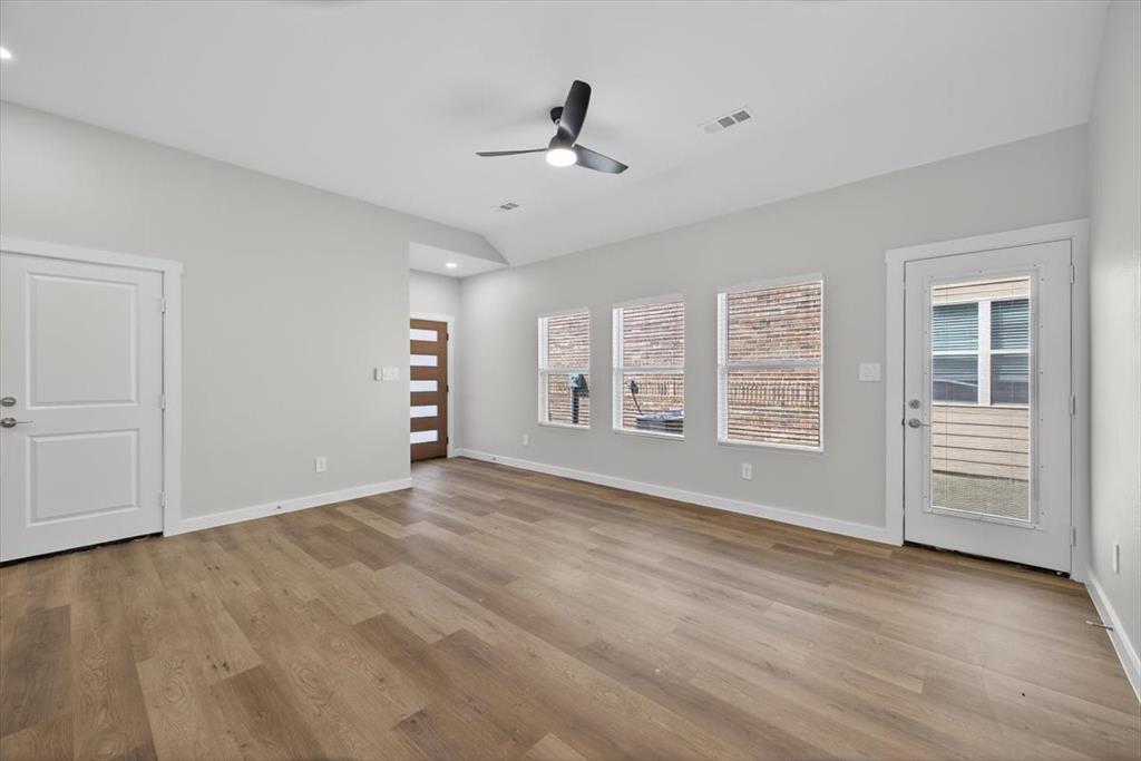 122 Wood Street, Unit A Princeton, TX 75407 - Photo 6 of 29 a view of an empty room with a window