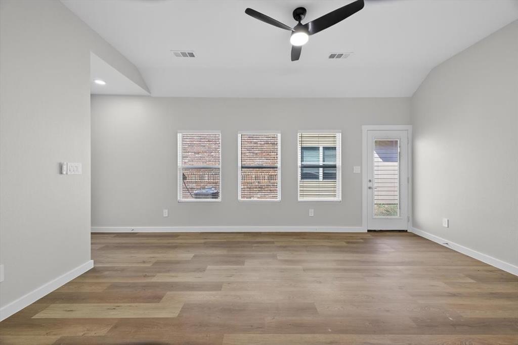 122 Wood Street, Unit A Princeton, TX 75407 - Photo 7 of 29 a view of an empty room with a window
