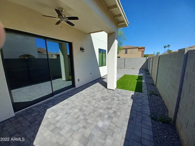 a bed room with a bed and a television