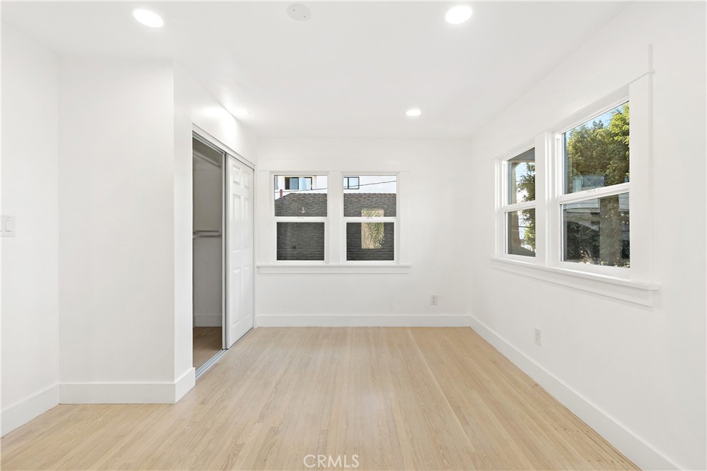 1148 Locust Avenue Long Beach, CA 90813 - Photo 15 of 34 a view of an empty room with a window