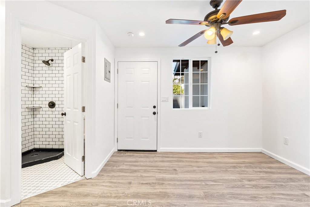 1148 Locust Avenue Long Beach, CA 90813 - Photo 28 of 34 a view of empty room with wooden floor and fan