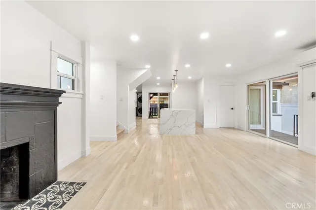 a view of a living room and a fireplace
