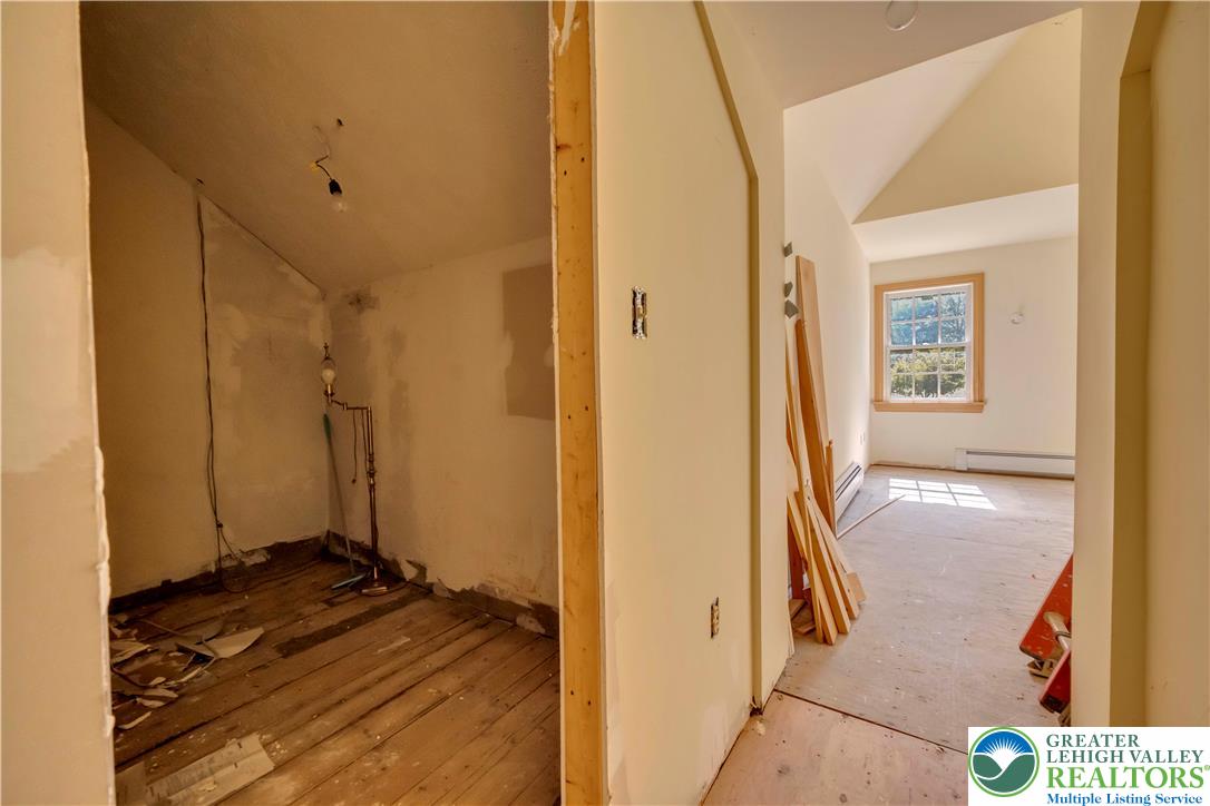 384 Henry Road Nazareth, PA 18064 - Photo 45 of 54 Vaulted ceilings and wide-plank wood flooring await your custom finishes in this versatile upper level.