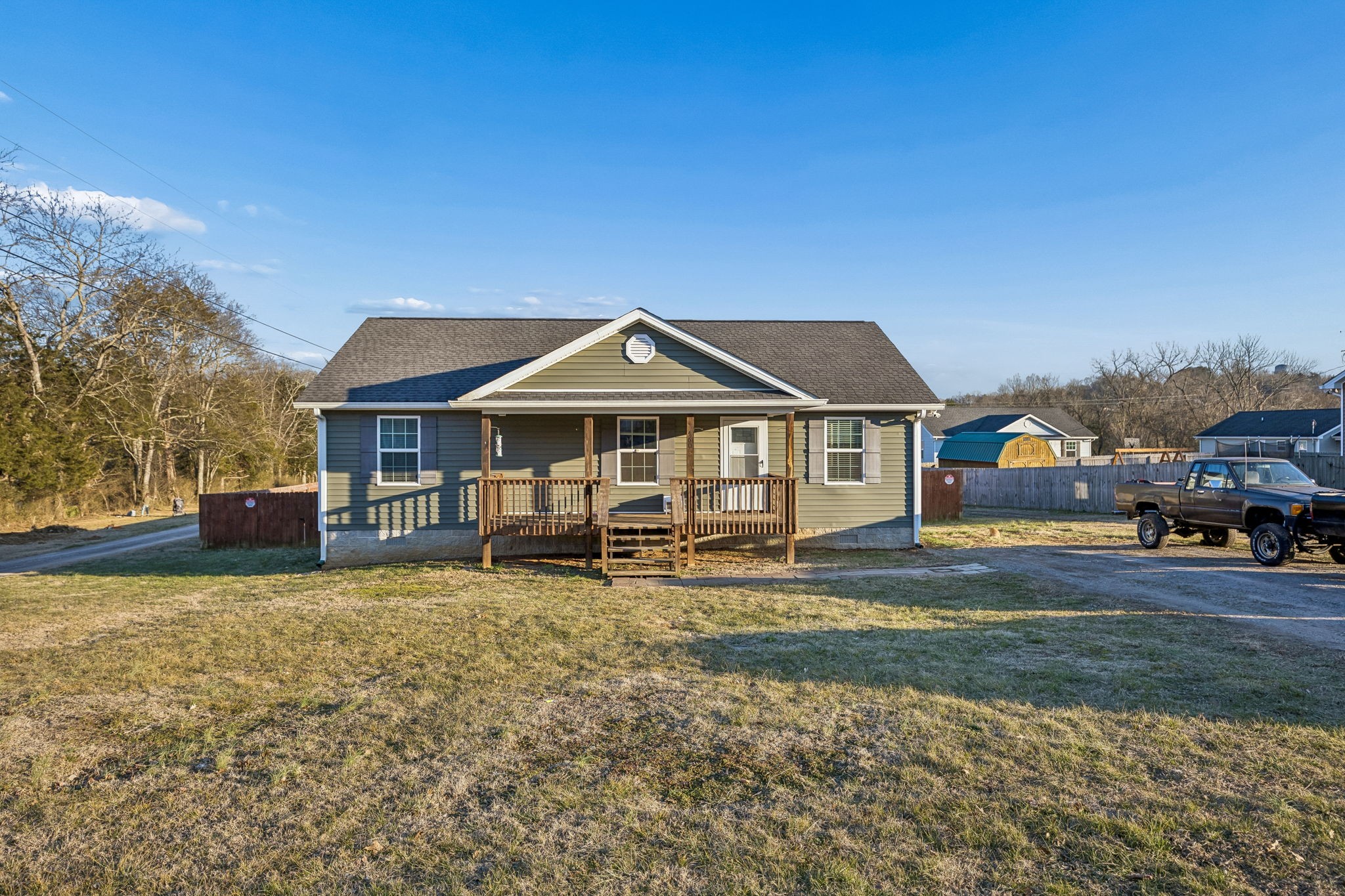 460 Edgewood Street Alexandria, TN 37012 - Photo 18 of 22 a front view of a house with a yard