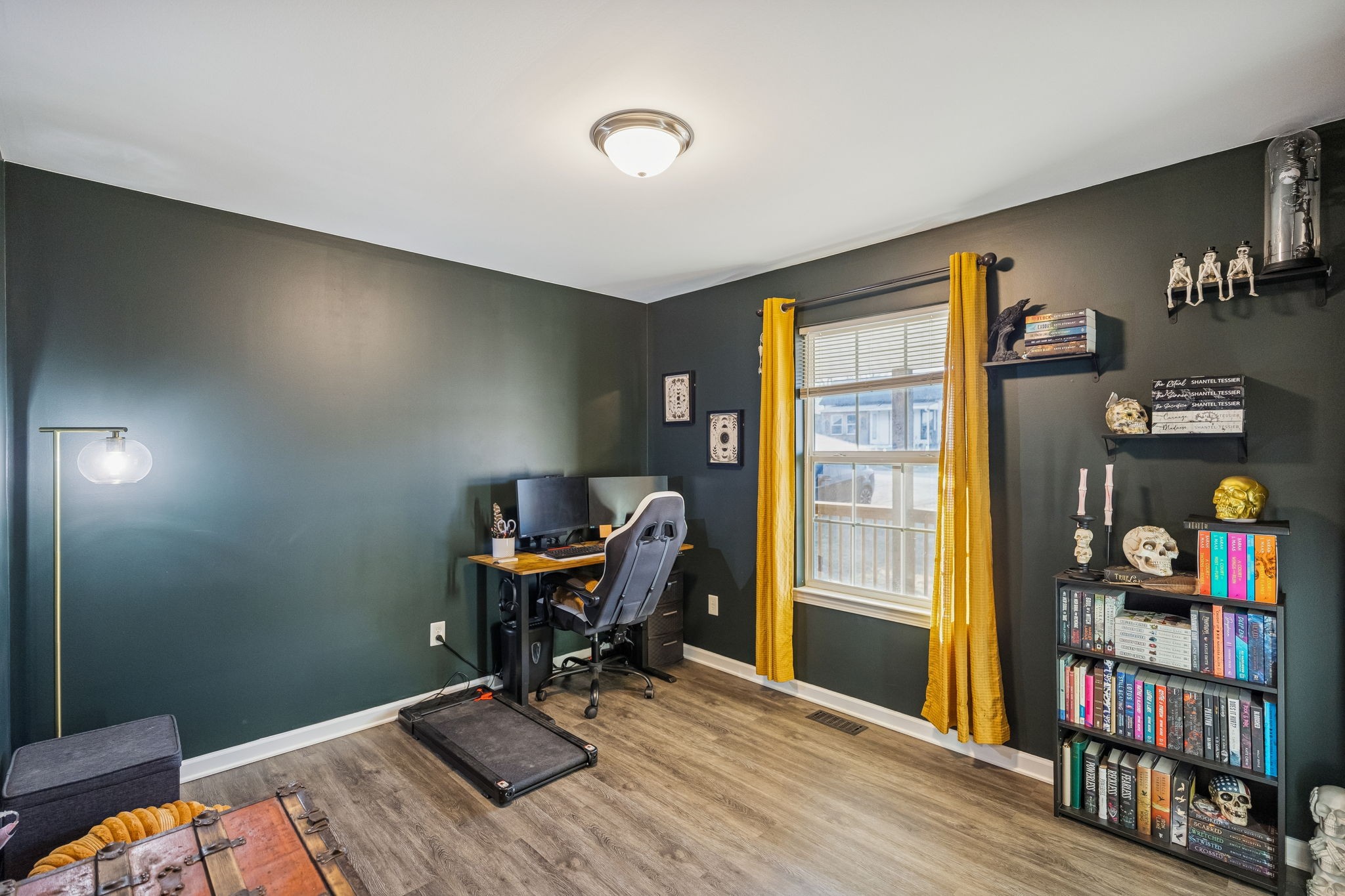 460 Edgewood Street Alexandria, TN 37012 - Photo 4 of 22 a workspace with furniture and bookshelf