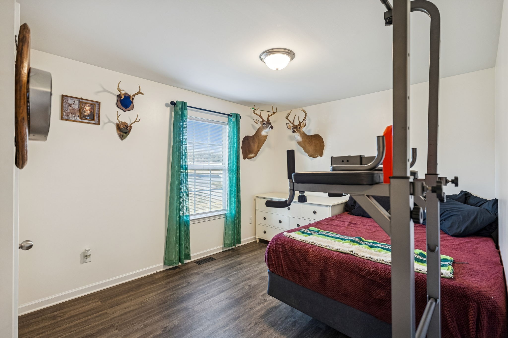 460 Edgewood Street Alexandria, TN 37012 - Photo 5 of 22 a bedroom with bed and a closet