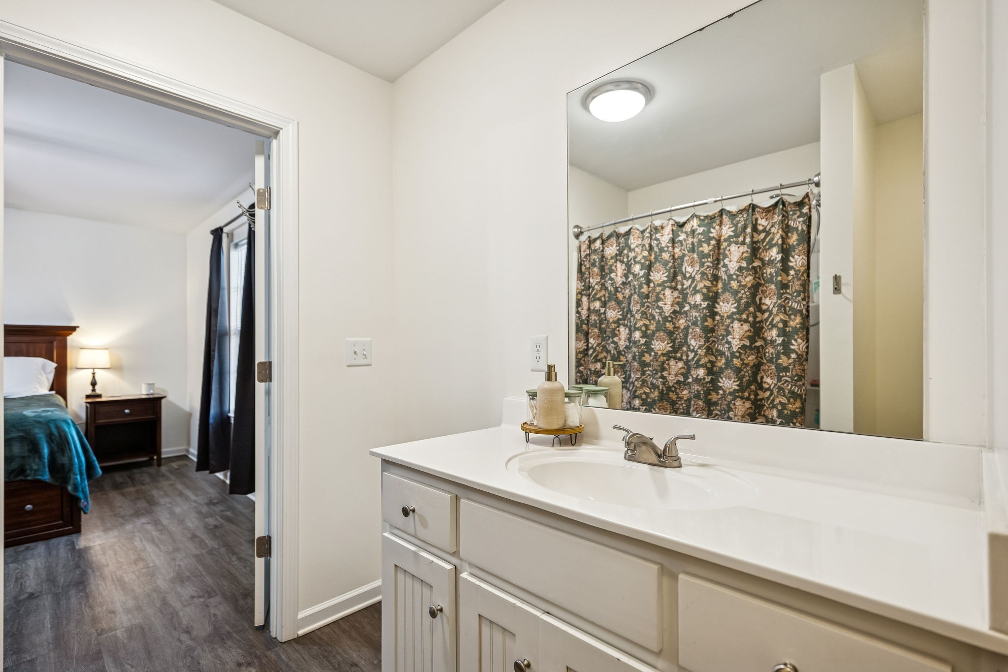 460 Edgewood Street Alexandria, TN 37012 - Photo 6 of 22 a bathroom with a sink and a mirror