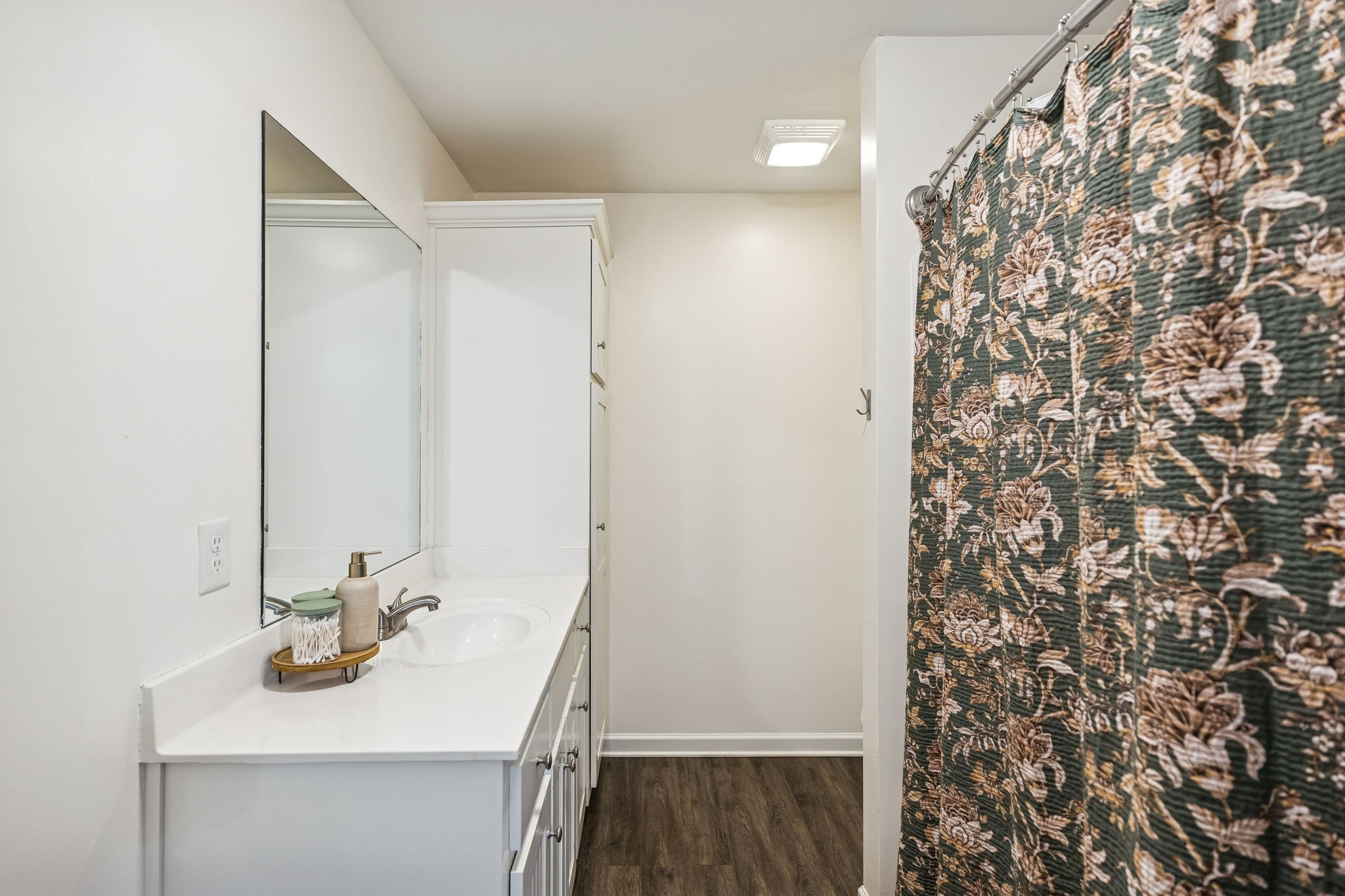 460 Edgewood Street Alexandria, TN 37012 - Photo 7 of 22 a bathroom with a sink and a mirror
