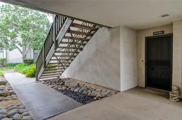 a view of entryway with stairs