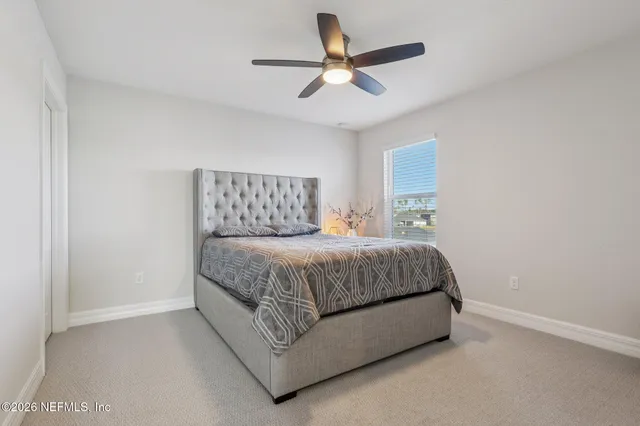 an aerial view of residential houses and city view