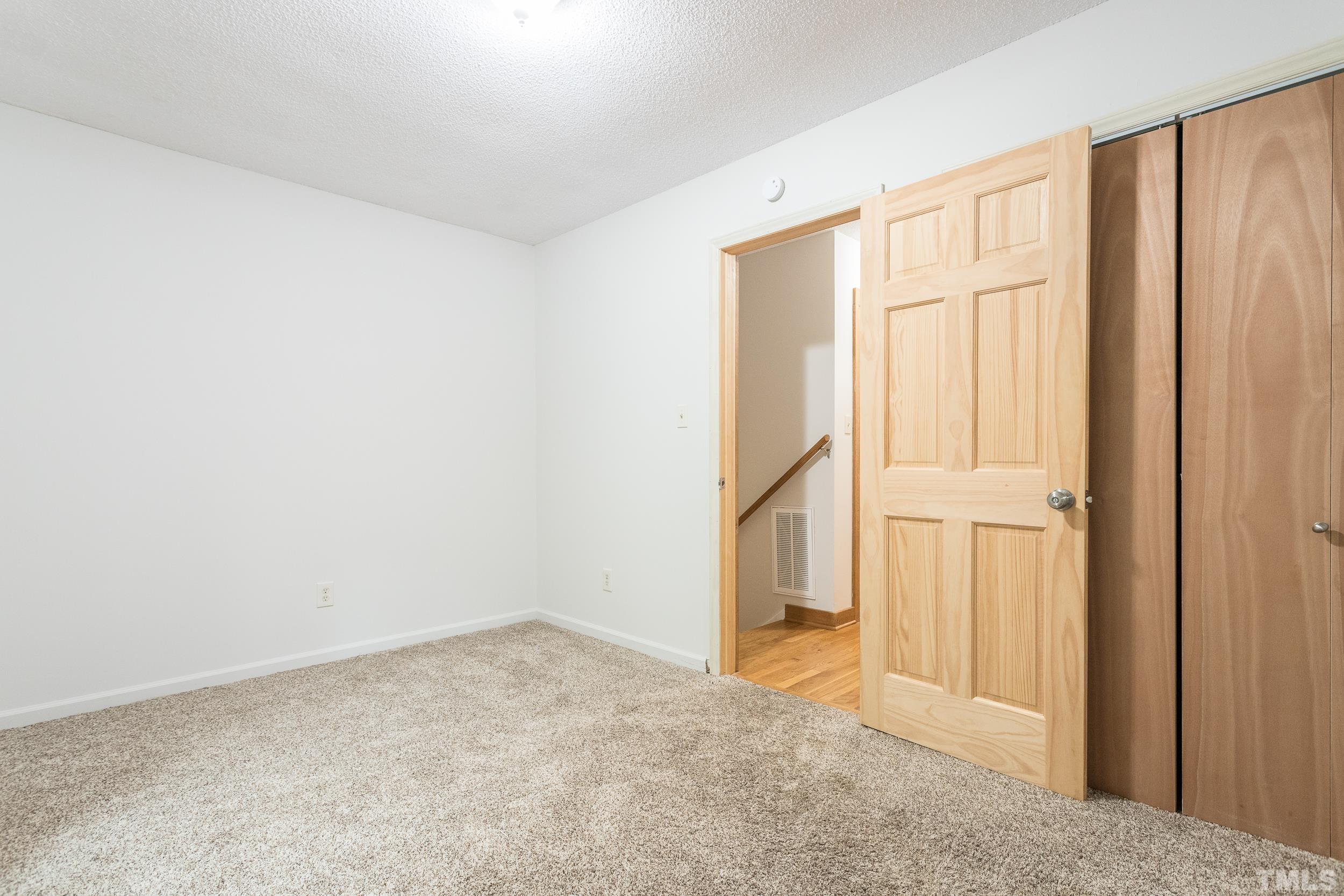 504 Merrie Road Raleigh, NC 27606 - Photo 14 of 25 a view of an empty room