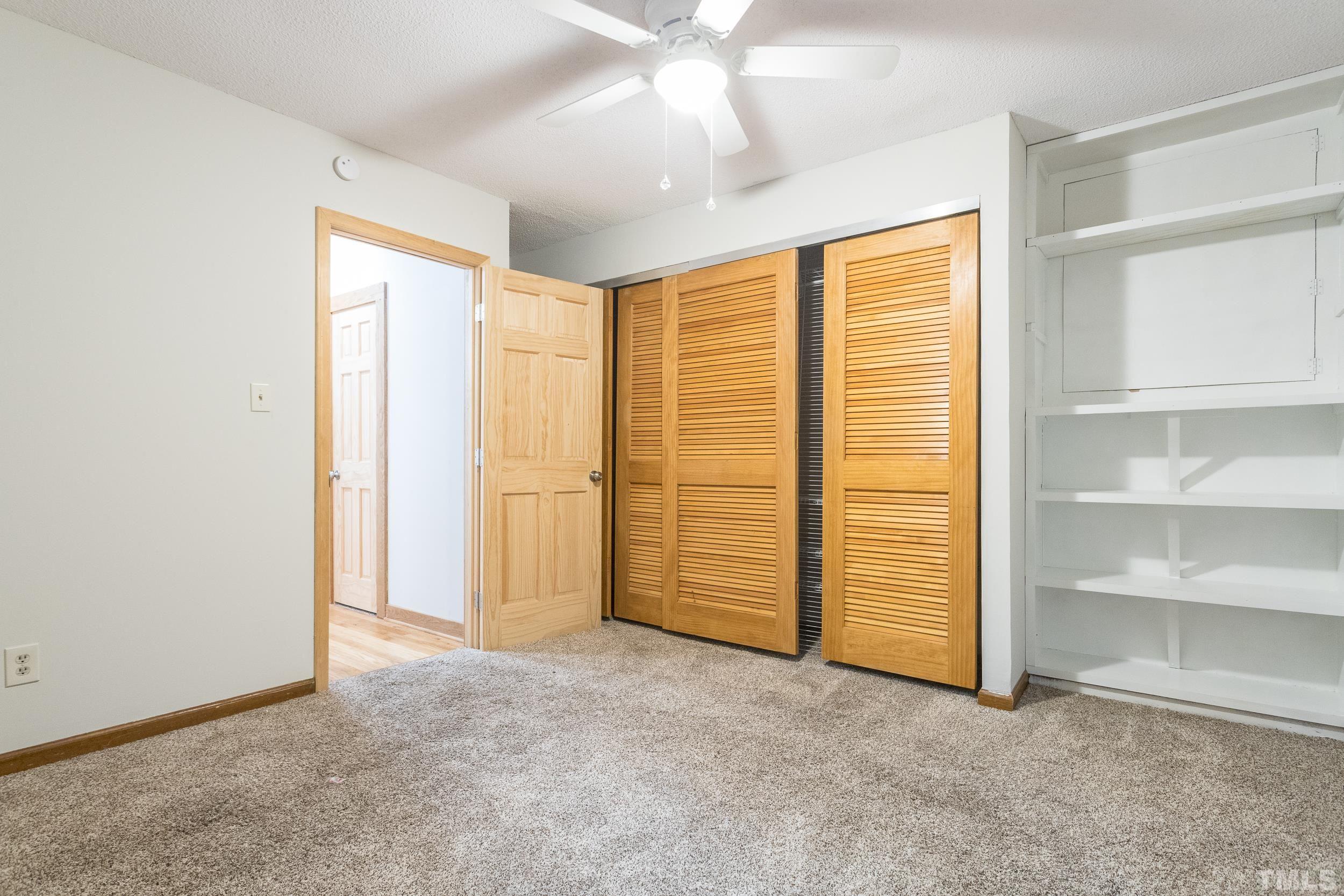 504 Merrie Road Raleigh, NC 27606 - Photo 16 of 25 an empty room with closet area