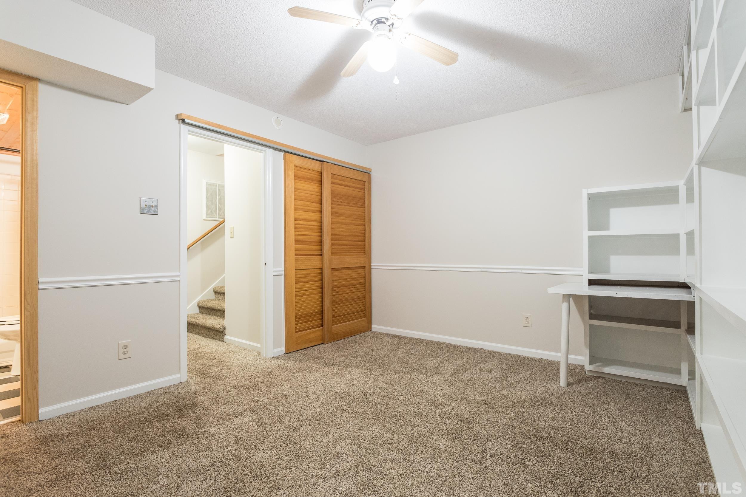 504 Merrie Road Raleigh, NC 27606 - Photo 18 of 25 an empty room with closet and windows