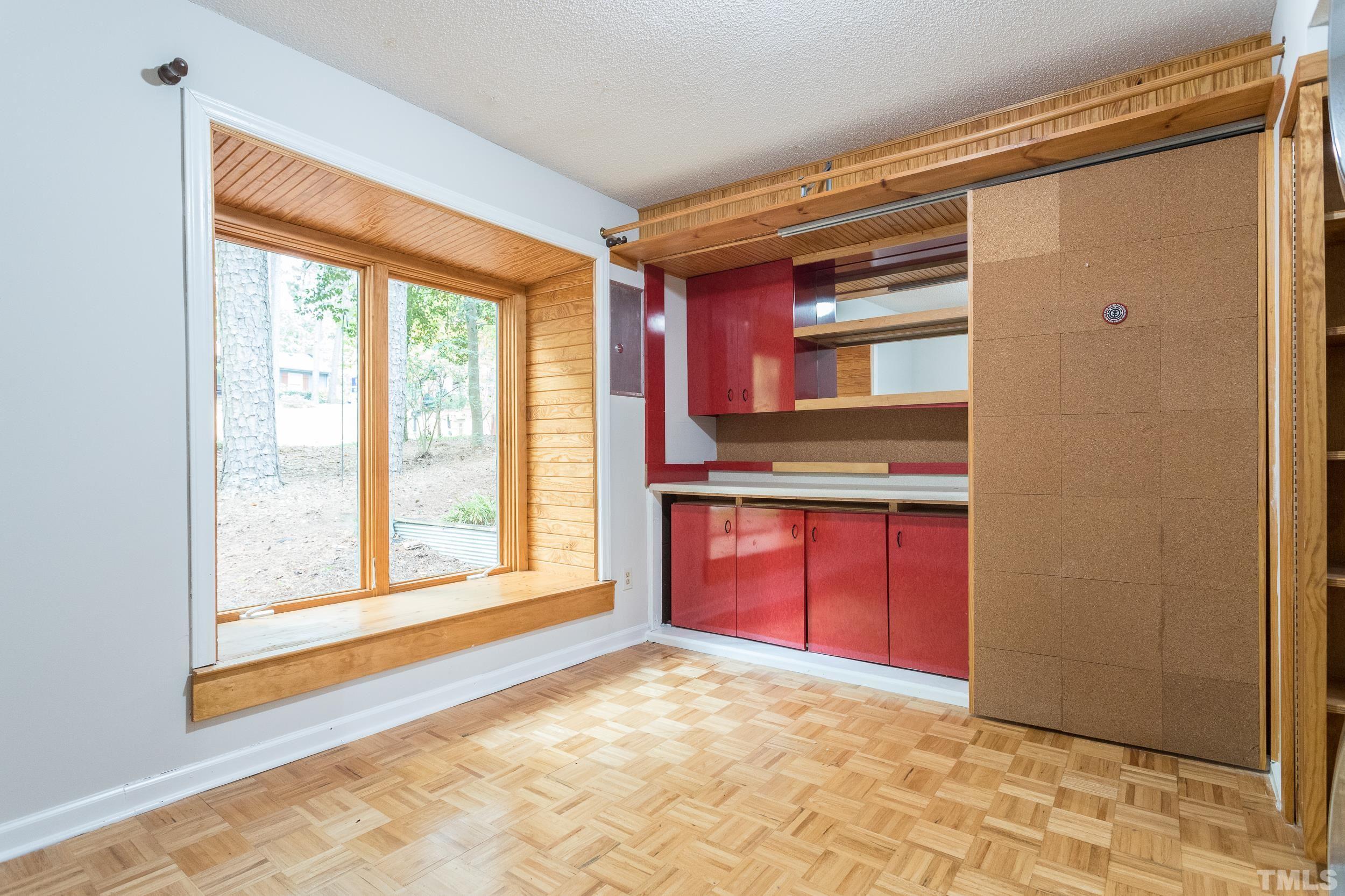 504 Merrie Road Raleigh, NC 27606 - Photo 21 of 25 a view of an empty room with window