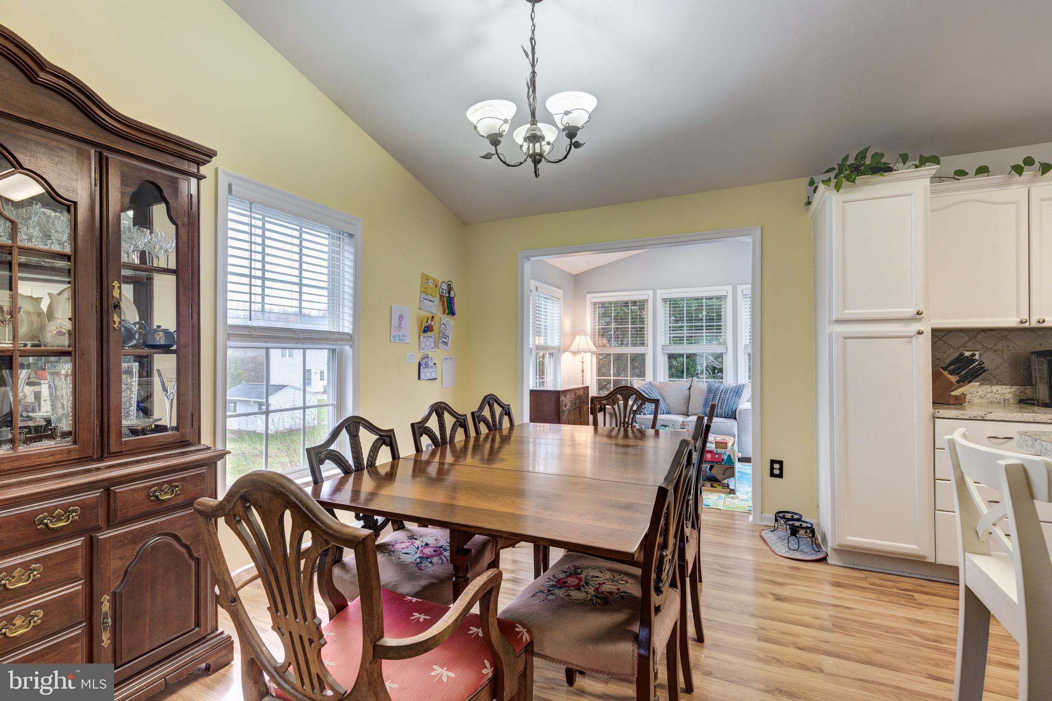 314 Huntinghorn Street Taneytown, MD 21787 - Photo 11 of 47 a view of a dining room with furniture window and outside view