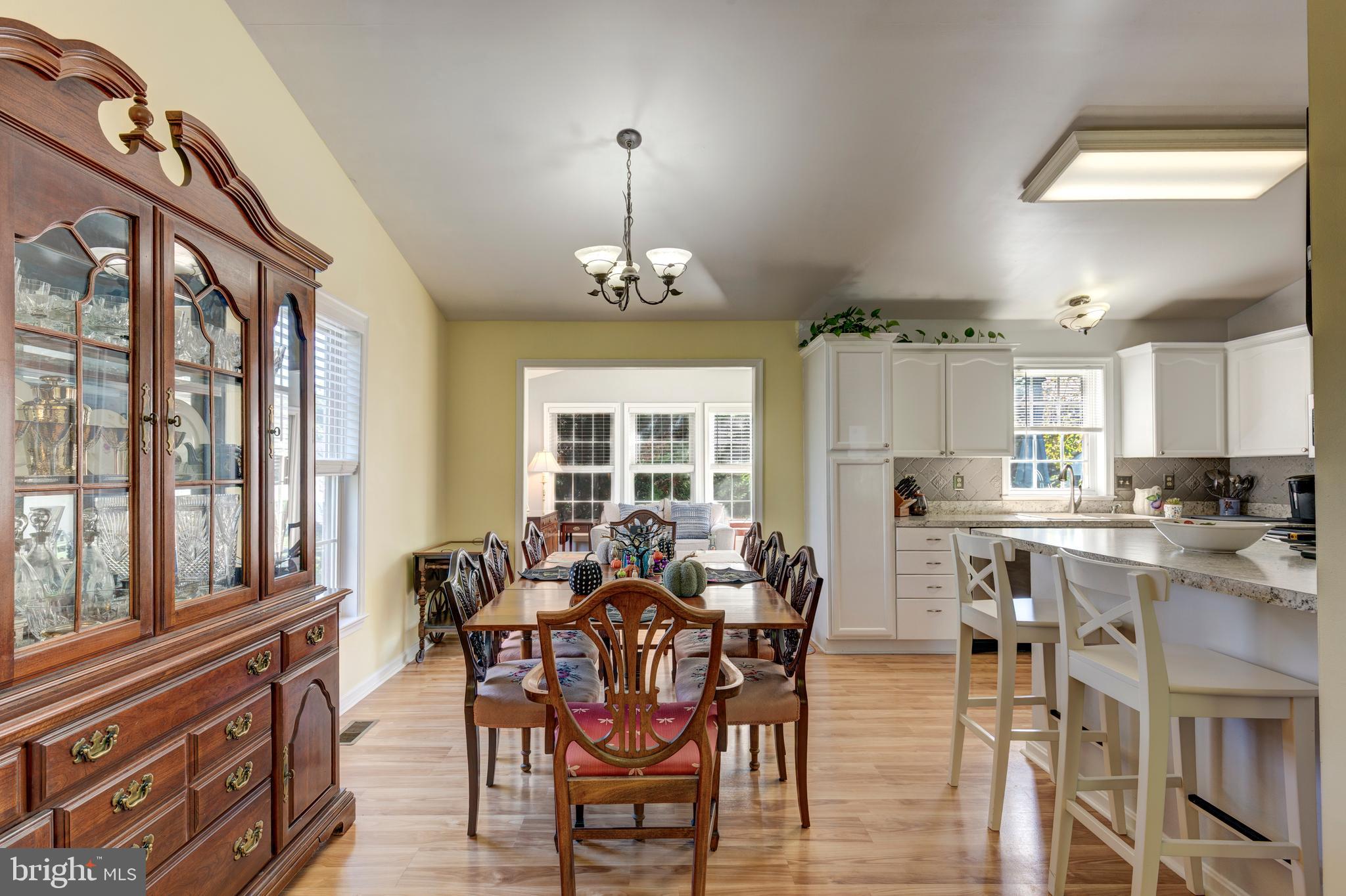 314 Huntinghorn Street Taneytown, MD 21787 - Photo 12 of 47 a view of a dining room with furniture window and outside view