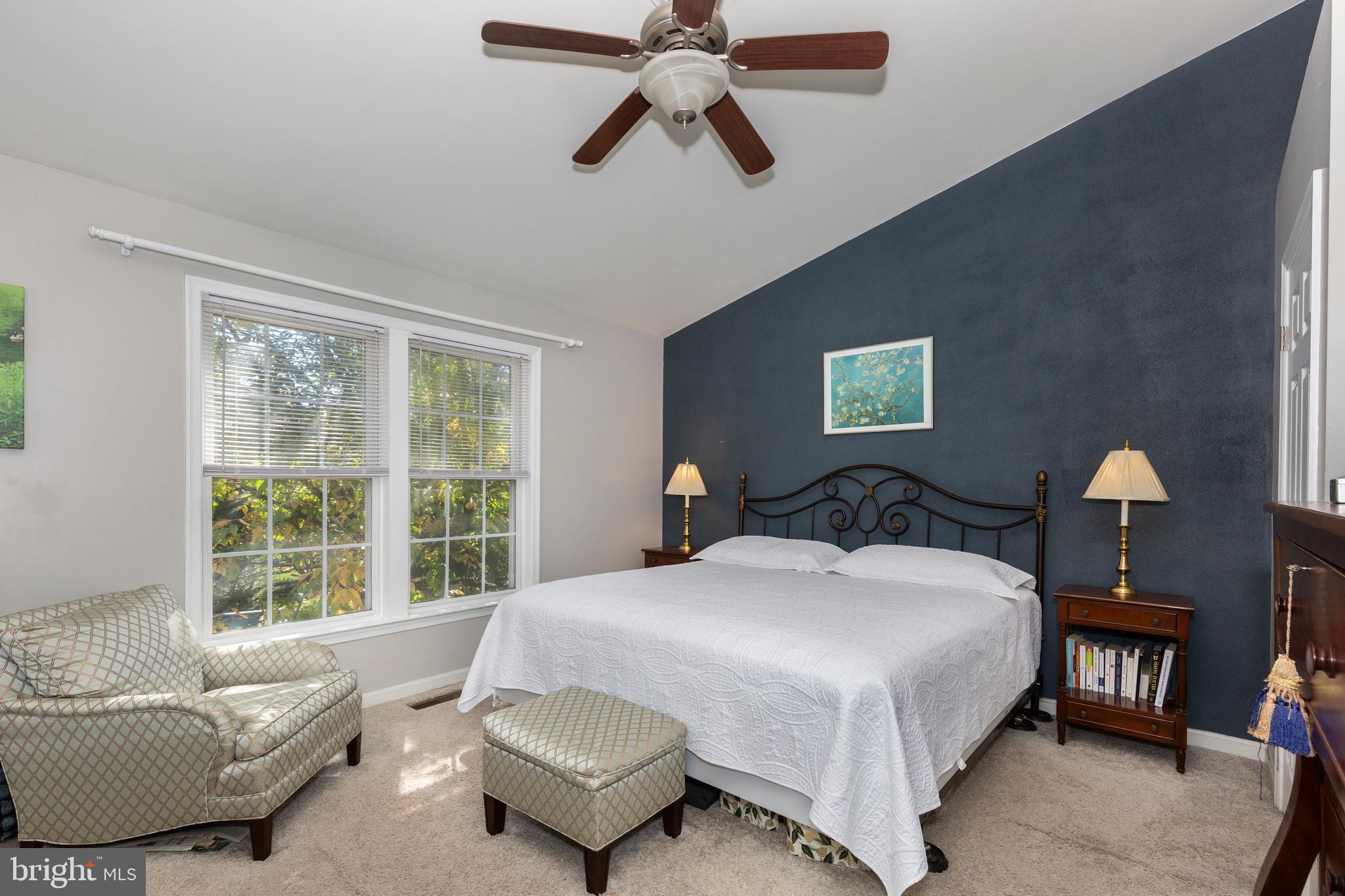 314 Huntinghorn Street Taneytown, MD 21787 - Photo 26 of 47 a bedroom with a bed couch and window