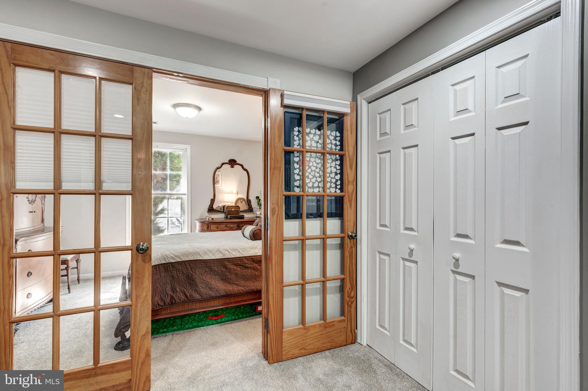 314 Huntinghorn Street Taneytown, MD 21787 - Photo 33 of 47 a bedroom with a large bed and a window