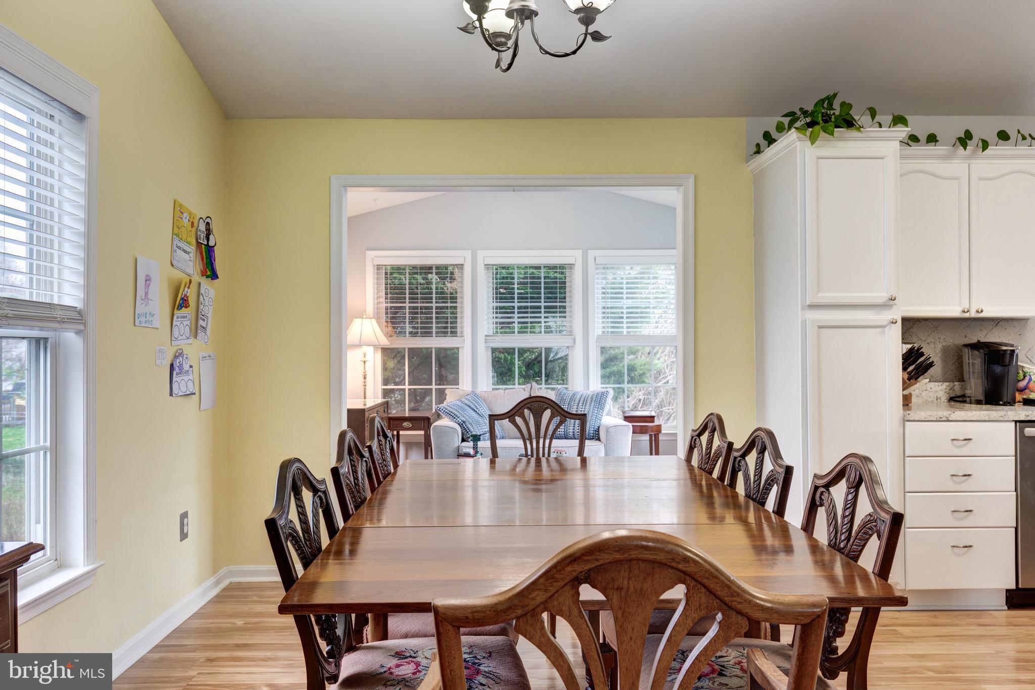 314 Huntinghorn Street Taneytown, MD 21787 - Photo 10 of 47 a view of a dining room with furniture window and outside view
