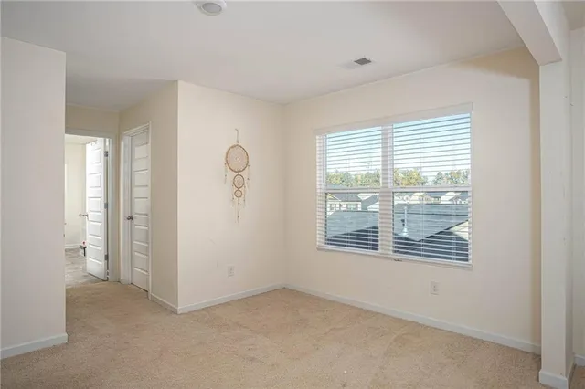 a bathroom with a sink and a window