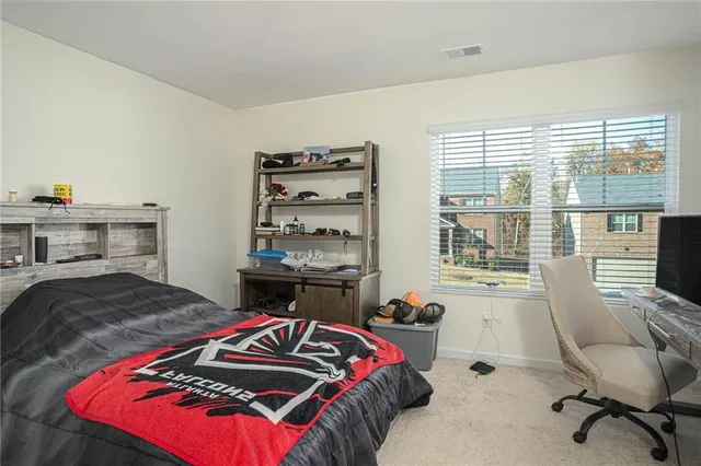 a bathroom with a sink double vanity and shower